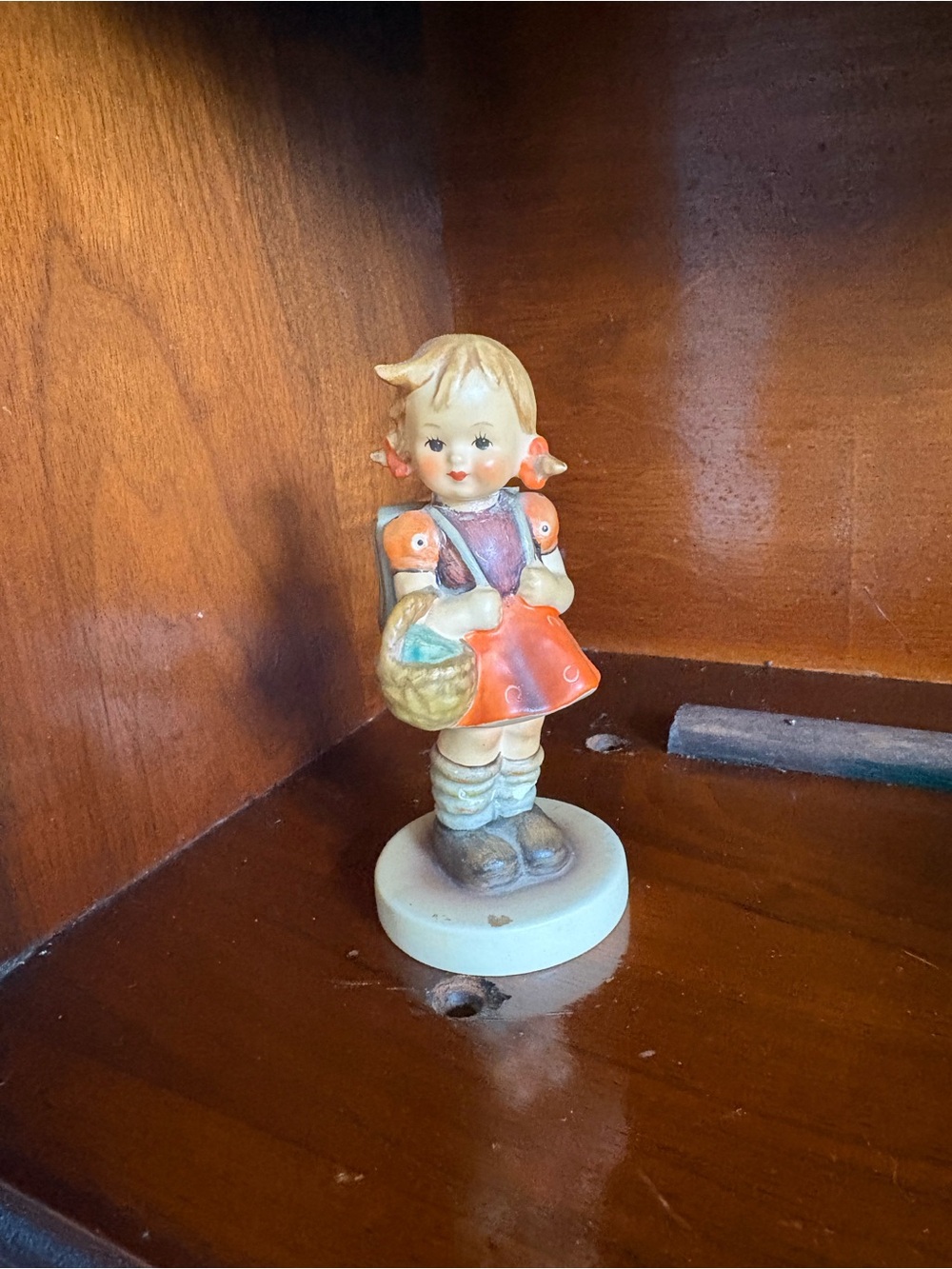 Hummel Hand-Painted Girl Figurine in Orange and Cream